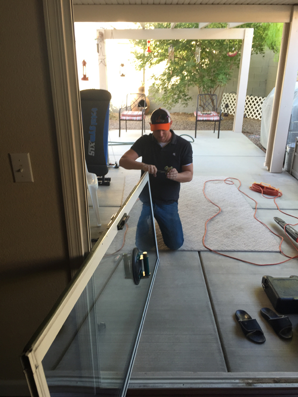 sliding door repair by a men